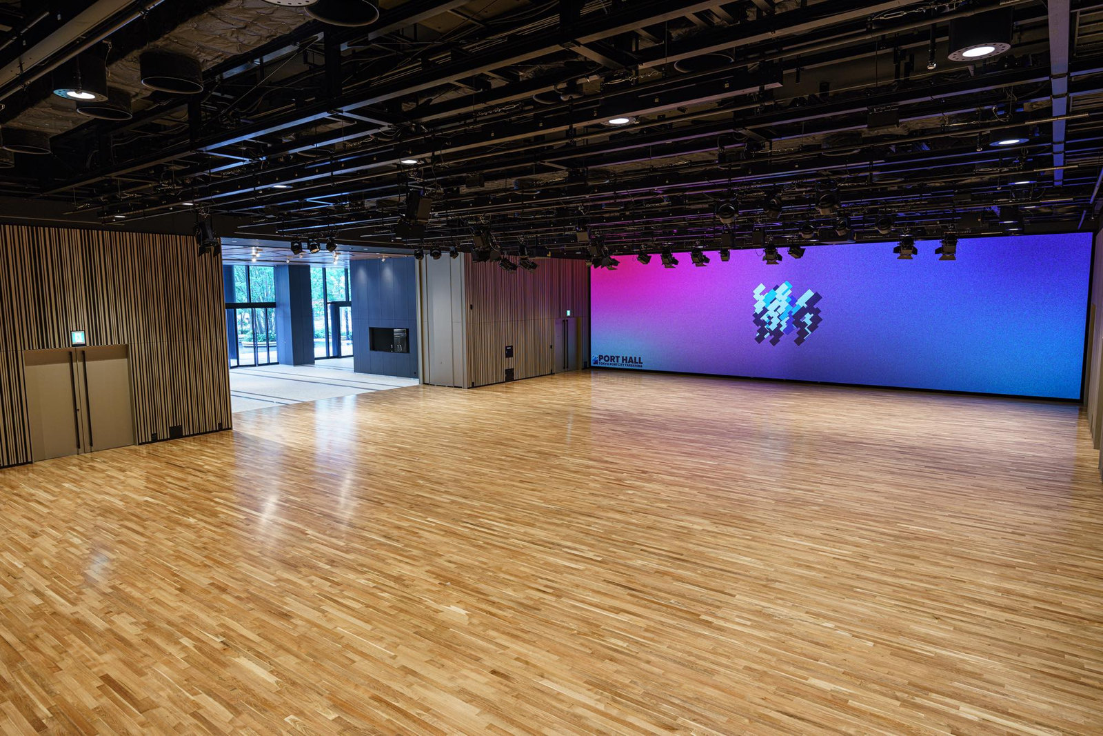 Port Hall, Tokyo Port City Takeshiba — the wooden floor and the LED wall
